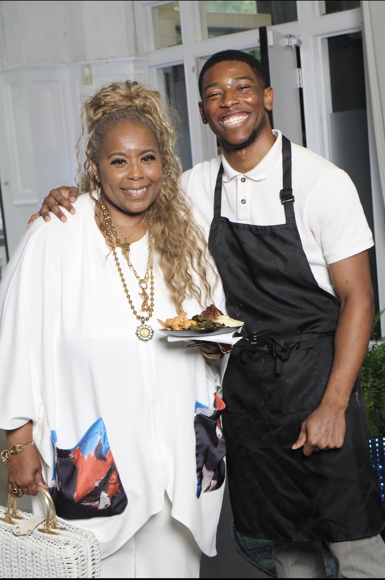 Chef Table team member with a guest at 621 Signature Events